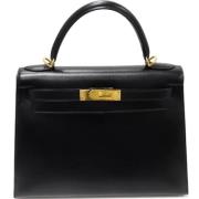 Pre-owned Leather handbags Hermès Vintage , Black , Dames