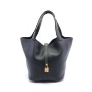 Pre-owned Leather handbags Hermès Vintage , Black , Dames