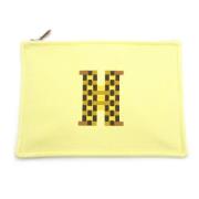 Pre-owned Canvas pouches Hermès Vintage , Yellow , Dames