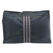 Pre-owned Canvas clutches Hermès Vintage , Black , Dames