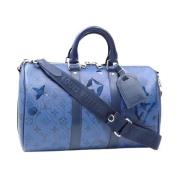 Pre-owned Canvas travel-bags Louis Vuitton Vintage , Blue , Dames