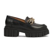 Casual platte schoenen op een chunky zool met een metalen decoratie Ka...