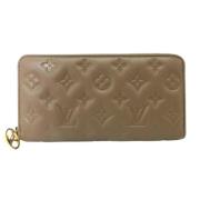 Pre-owned Leather wallets Louis Vuitton Vintage , Beige , Dames