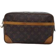 Pre-owned Canvas clutches Louis Vuitton Vintage , Brown , Dames