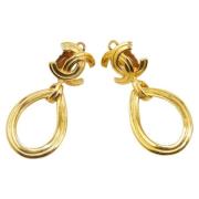 Pre-owned Metal earrings Chanel Vintage , Yellow , Dames