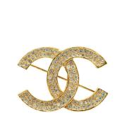 Pre-owned Metal brooches Chanel Vintage , Yellow , Dames