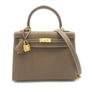 Pre-owned Leather handbags Hermès Vintage , Brown , Dames