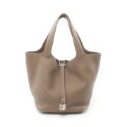 Pre-owned Leather handbags Hermès Vintage , Beige , Dames