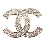 Pre-owned Metal brooches Chanel Vintage , Yellow , Dames