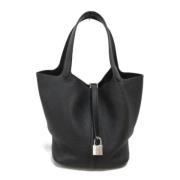 Pre-owned Leather handbags Hermès Vintage , Black , Dames