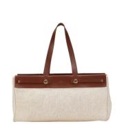 Pre-owned Canvas handbags Hermès Vintage , Beige , Dames