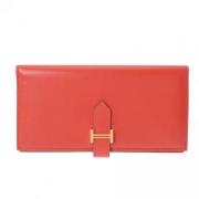 Pre-owned Leather wallets Hermès Vintage , Orange , Unisex