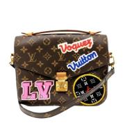 Pre-owned Canvas clutches Louis Vuitton Vintage , Brown , Dames