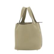 Pre-owned Leather handbags Hermès Vintage , Beige , Dames