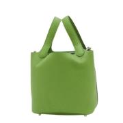 Pre-owned Leather handbags Hermès Vintage , Green , Dames