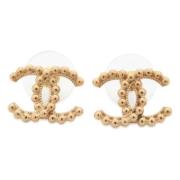 Pre-owned Metal earrings Chanel Vintage , Yellow , Dames