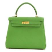 Pre-owned Leather handbags Hermès Vintage , Green , Dames