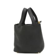 Pre-owned Leather handbags Hermès Vintage , Black , Dames