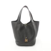 Pre-owned Leather handbags Hermès Vintage , Black , Dames