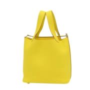 Pre-owned Leather handbags Hermès Vintage , Yellow , Dames