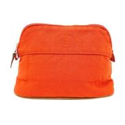 Pre-owned Cotton pouches Hermès Vintage , Orange , Dames