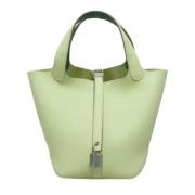 Pre-owned Leather handbags Hermès Vintage , Green , Dames