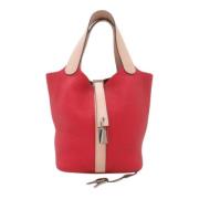 Pre-owned Leather handbags Hermès Vintage , Red , Dames