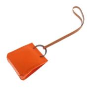 Pre-owned Fabric key-holders Hermès Vintage , Orange , Dames