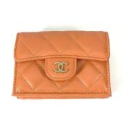 Pre-owned Leather wallets Chanel Vintage , Orange , Dames