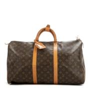 Pre-owned Coated canvas handbags Louis Vuitton Vintage , Brown , Dames