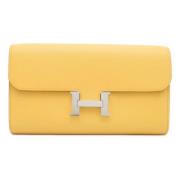 Pre-owned Leather wallets Hermès Vintage , Yellow , Dames