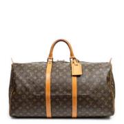 Pre-owned Coated canvas handbags Louis Vuitton Vintage , Brown , Dames