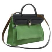 Pre-owned Canvas handbags Hermès Vintage , Green , Dames