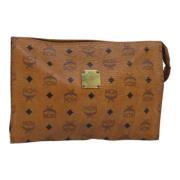 Pre-owned Canvas clutches MCM Pre-owned , Brown , Dames