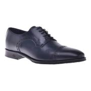 Lace-ups in dark blue leather Baldinini , Blue , Heren