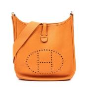 Pre-owned Leather shoulder-bags Hermès Vintage , Orange , Dames