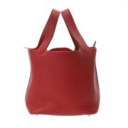 Pre-owned Leather handbags Hermès Vintage , Red , Dames