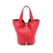 Pre-owned Leather handbags Hermès Vintage , Red , Dames