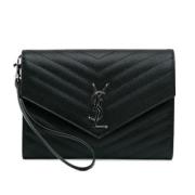 Pre-owned Leather clutches Yves Saint Laurent Vintage , Black , Dames