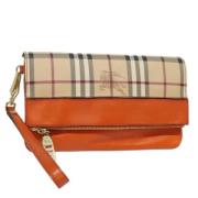 Pre-owned Leather clutches Burberry Vintage , Beige , Dames