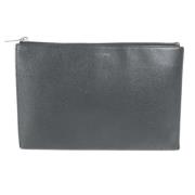 Pre-owned Leather clutches Yves Saint Laurent Vintage , Black , Dames