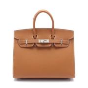 Pre-owned Canvas handbags Hermès Vintage , Brown , Dames