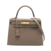 Pre-owned Leather handbags Hermès Vintage , Brown , Dames