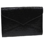 Pre-owned Leather clutches Yves Saint Laurent Vintage , Black , Dames