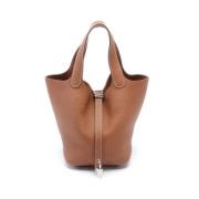 Pre-owned Leather handbags Hermès Vintage , Brown , Dames