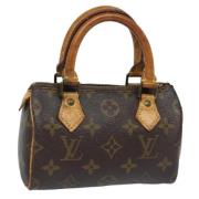 Pre-owned Canvas handbags Louis Vuitton Vintage , Brown , Dames