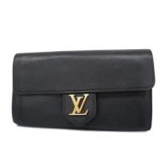 Pre-owned Fabric wallets Louis Vuitton Vintage , Black , Dames