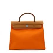 Pre-owned Leather handbags Hermès Vintage , Orange , Dames