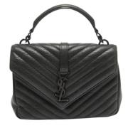 Pre-owned Leather handbags Yves Saint Laurent Vintage , Black , Dames