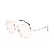 Pre-owned Metal sunglasses Chanel Vintage , Yellow , Dames